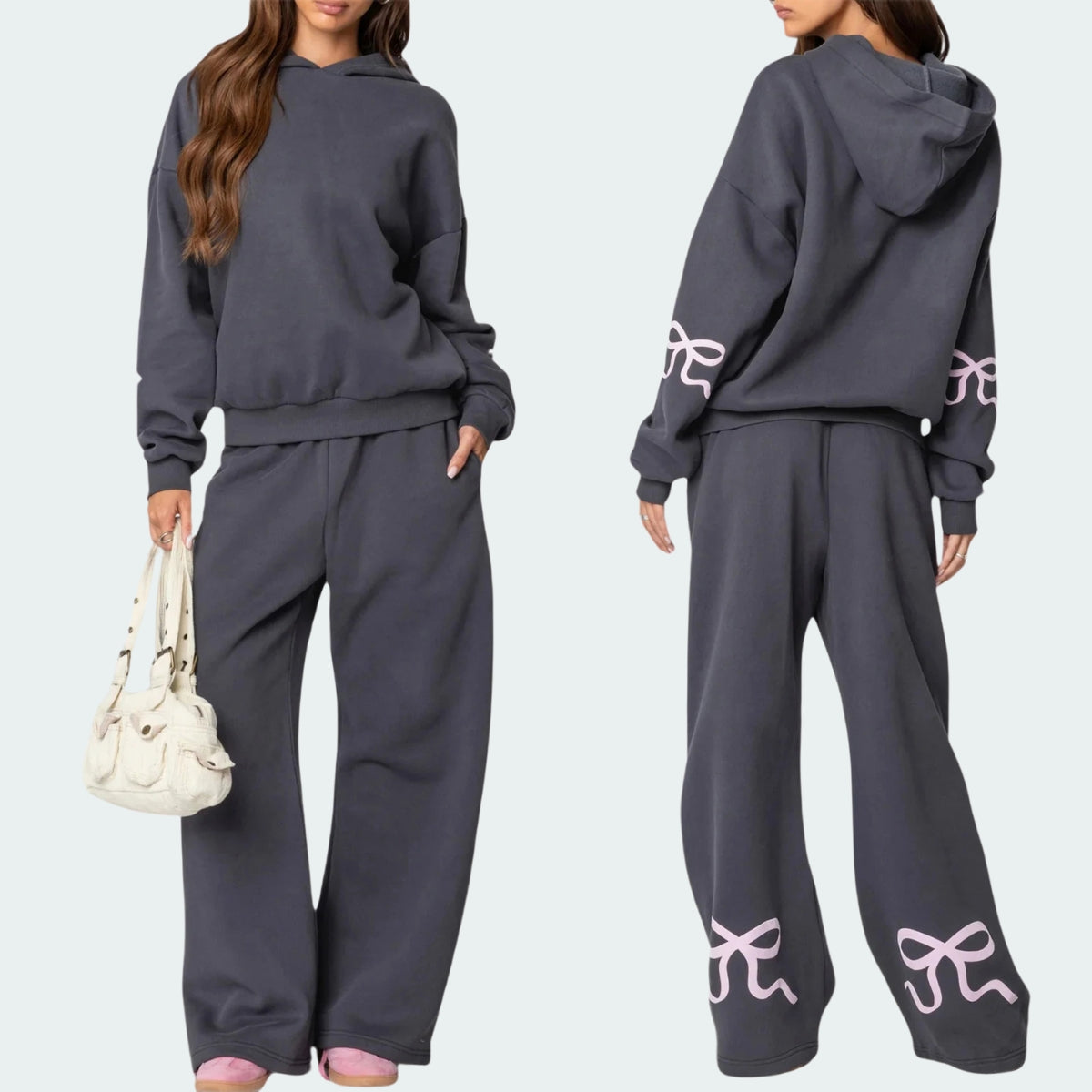 Luna Ribbon Tracksuit - Elegantie in Comfort Een stijlvolle en comfortabele tracksuit met speelse strikdetails op de mouwen en broek. Ideaal voor ontspannen dagen en casual ui