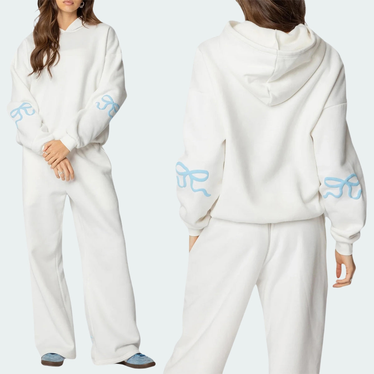 Luna Ribbon Tracksuit - Elegantie in Comfort Witte tracksuit met zachte blauwe strikaccenten op mouwen en broekspijpen. Ideaal voor een frisse, casual look. Shop exclusief op