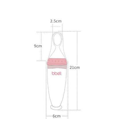 Een schematische tekening van de Roze BabyHap™ Lepel-Knijpfles met gedetailleerde afmetingen 21 cm hoog, 2,5 cm breed bij de tuit en 6 cm breed bij de basis.
