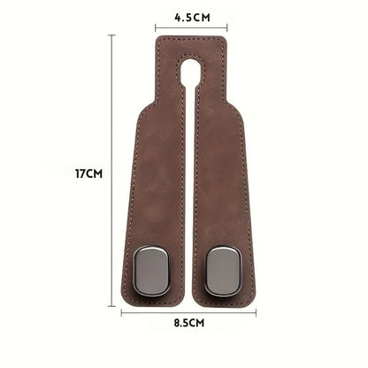HangEase™ Organizer van Inicala.nl – luxe dubbele autostoelhaak in bruin suède, met afmetingen 17x8,5 cm. Perfect voor het ophangen van tassen en accessoires in